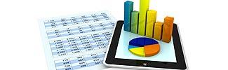 image of spreadsheet and table computer with bar graph and pie chart